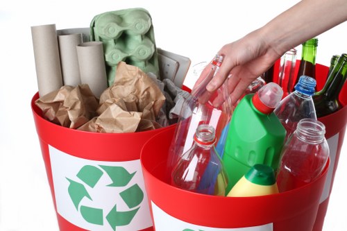 Team implementing a waste management plan in an office
